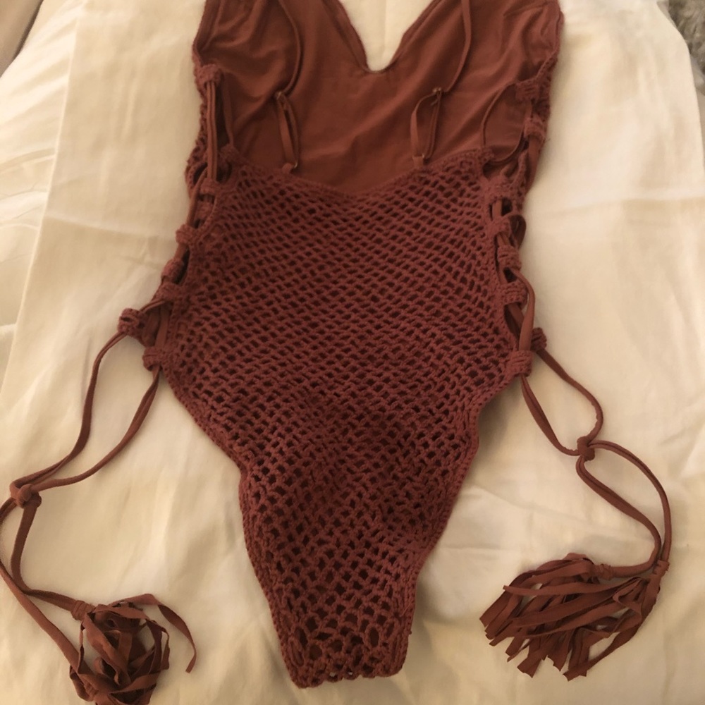 New One piece knit open weave side cut outs